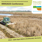 Wet landscape with harvesting machine.