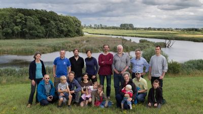 Researchers in a wet landscape.